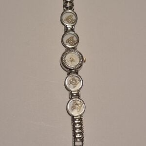 Silver and Gold Channel Watch with Embellished Faces